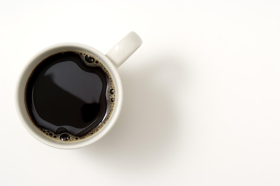 Isolated shot of a cup of coffee on white background Photograph by Kyoshino