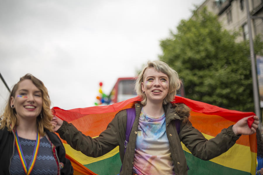 Lesbian couple celebrating Pride #1 Photograph by David Levingstone