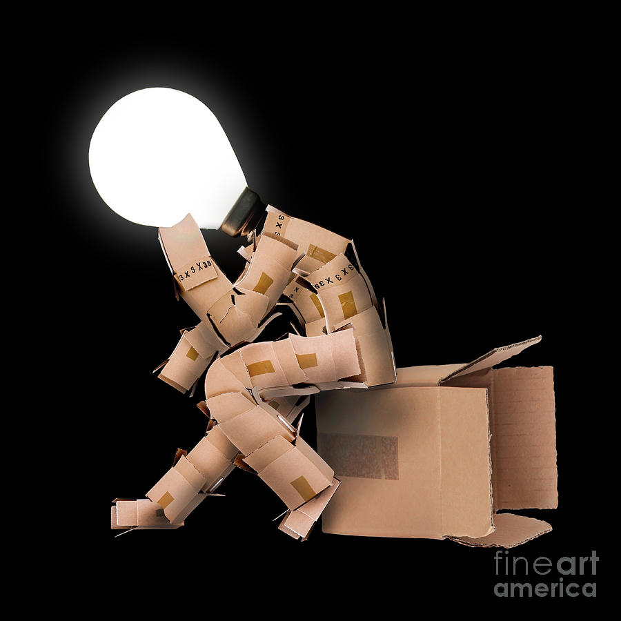 Light bulb box man character Photograph by Simon Bratt