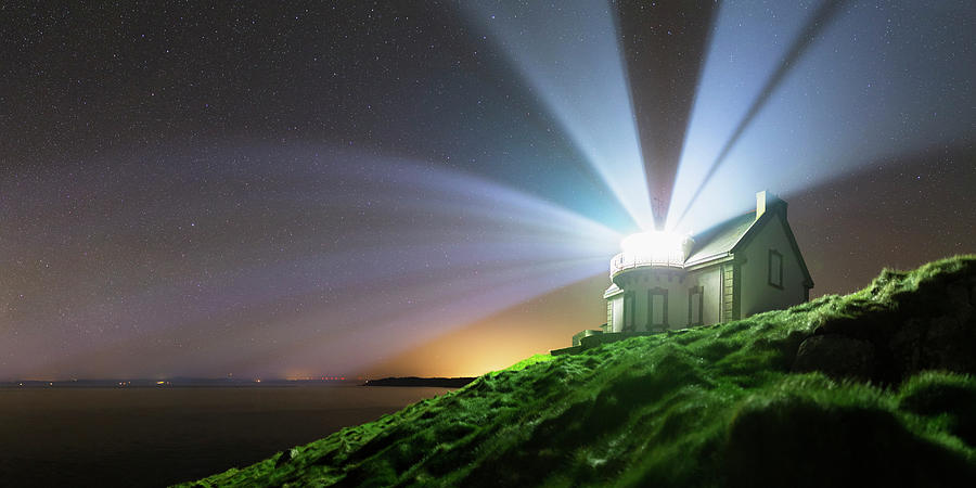 Lighthouse Beams At Night #1 Photograph by Laurent Laveder