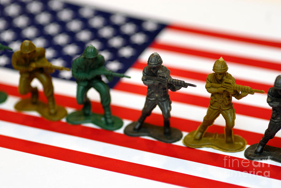 Flag Photograph - Line of Toy Soldiers on American Flag Shallow Depth of Field #1 by Amy Cicconi