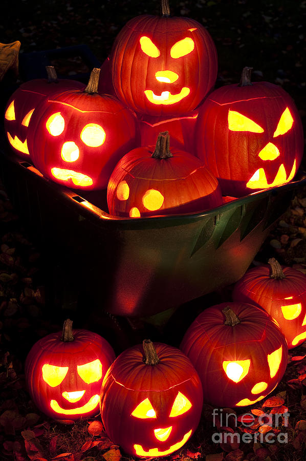 Lit Carved Pumpkins In A Wheel Barrow #6 Photograph by Jim Corwin