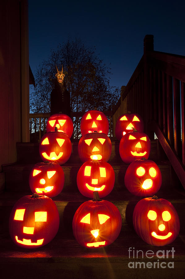 Lit Pumpkins with Demon on Halloween Photograph by Jim Corwin