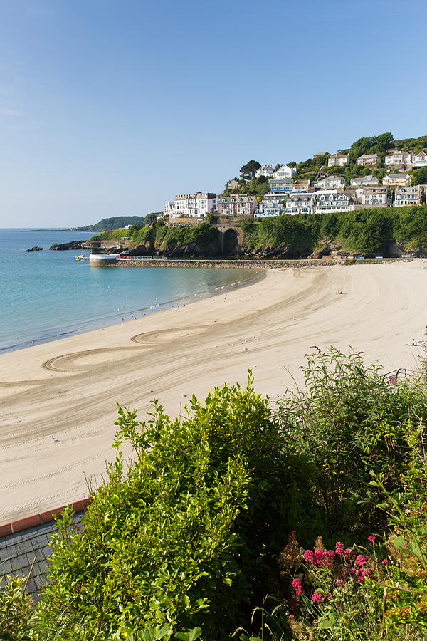 Looe Beach Cornwall England With Blue Sea And Sky On A Sunny Summer Day