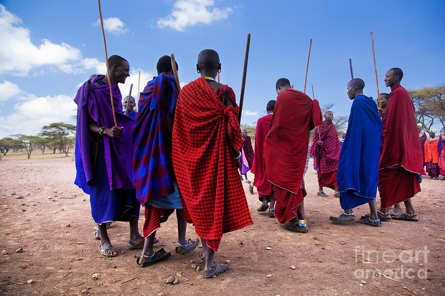 Nature Photograph - Maasai men in their ritual dance in their village in Tanzania #1 by Michal Bednarek