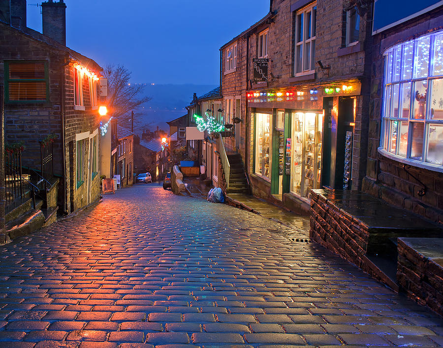 Main Street in Haworth Yorkshire UK at Christmas time Photograph by Ken