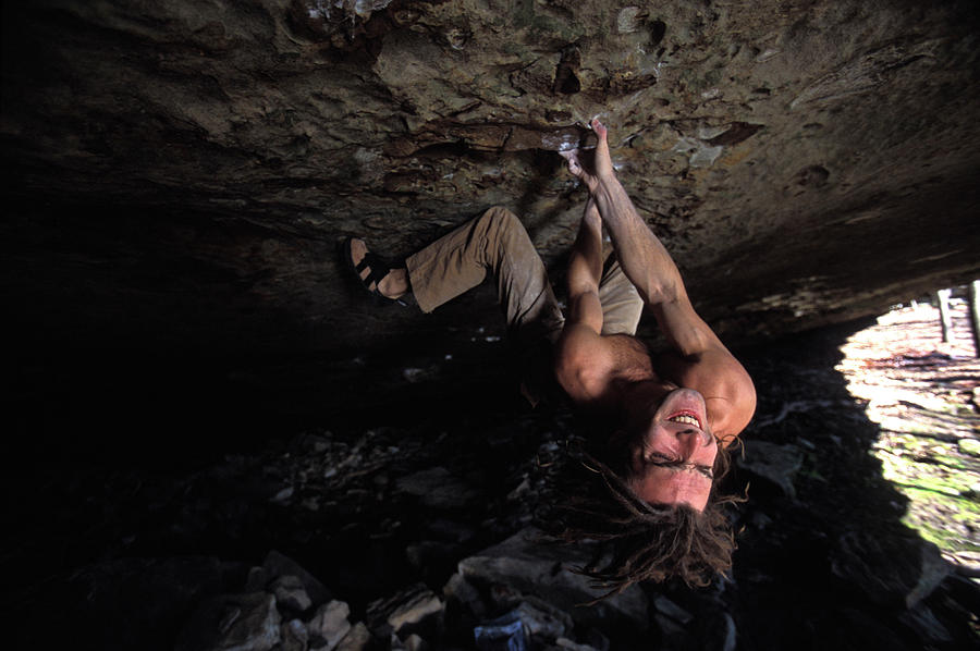 Sports Photograph - Man Bouldering On A Difficult #1 by Corey Rich