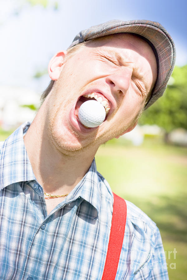 Man Catches Golf Ball In Mouth Photograph by Jorgo Photography