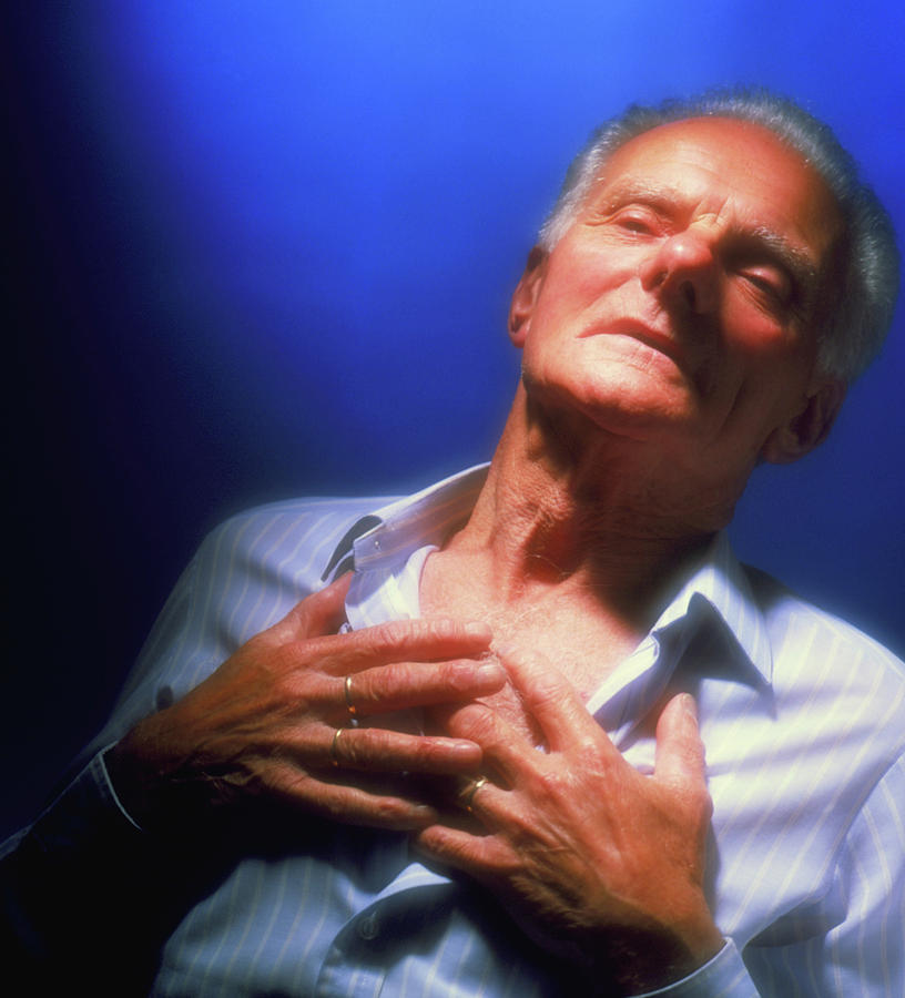 Man Holds His Chest Due To Angina Or Heart Attack #1 Photograph by Saturn Stills/science Photo Library