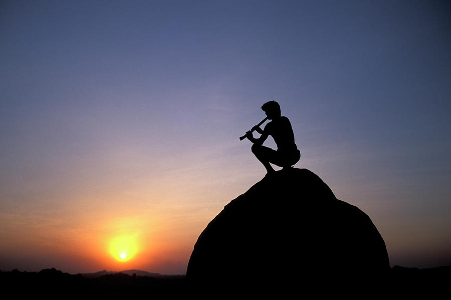 Music Photograph - Man Playing Flute At Sunset On Top #1 by Corey Rich