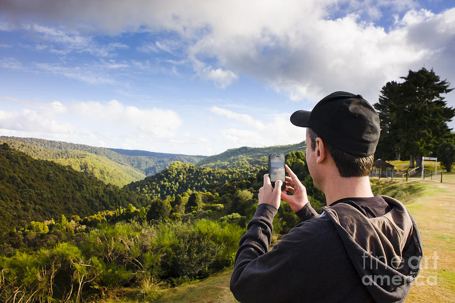 Man taking mountain photo of Tarkine reserve #1 Photograph by Jorgo Photography