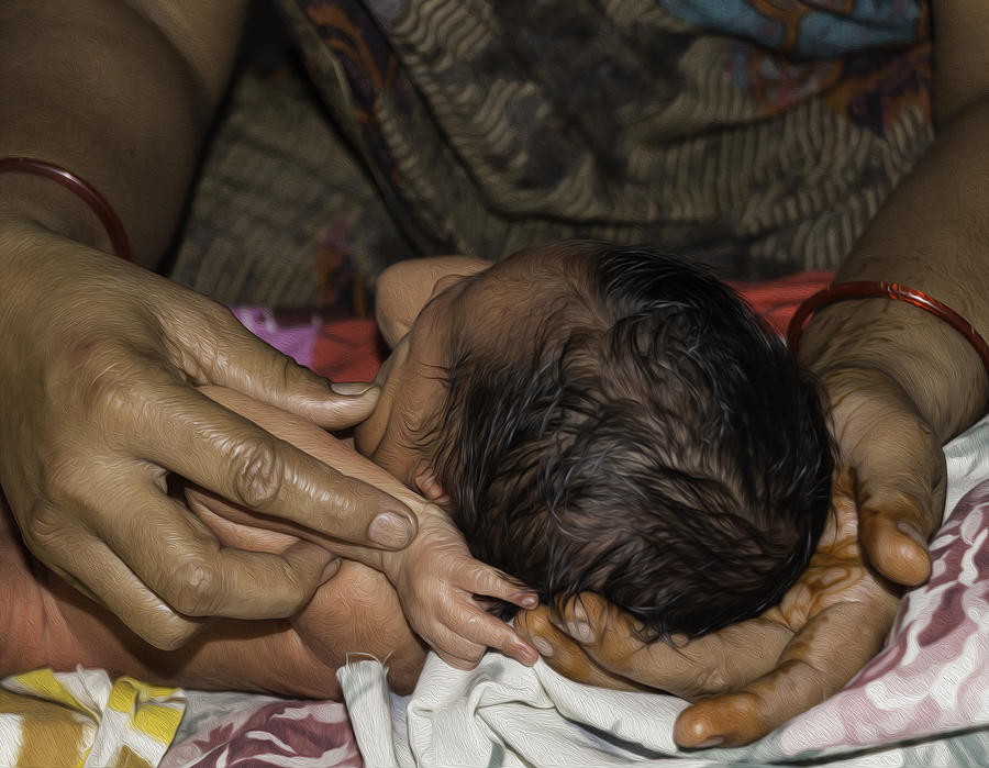 Baby Photograph - Masseuse doing light massage of hands of a 5 day old Indian baby #1 by Ashish Agarwal