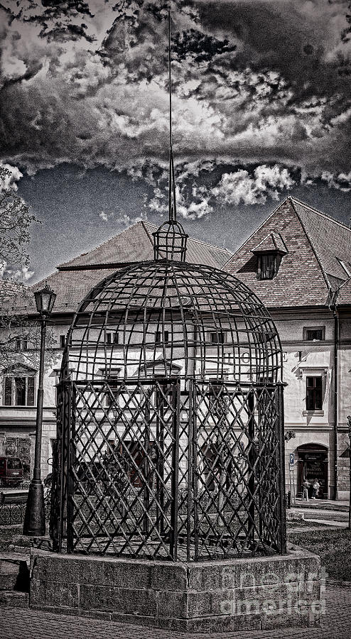 Medieval cage of shame #1 Photograph by Les Palenik