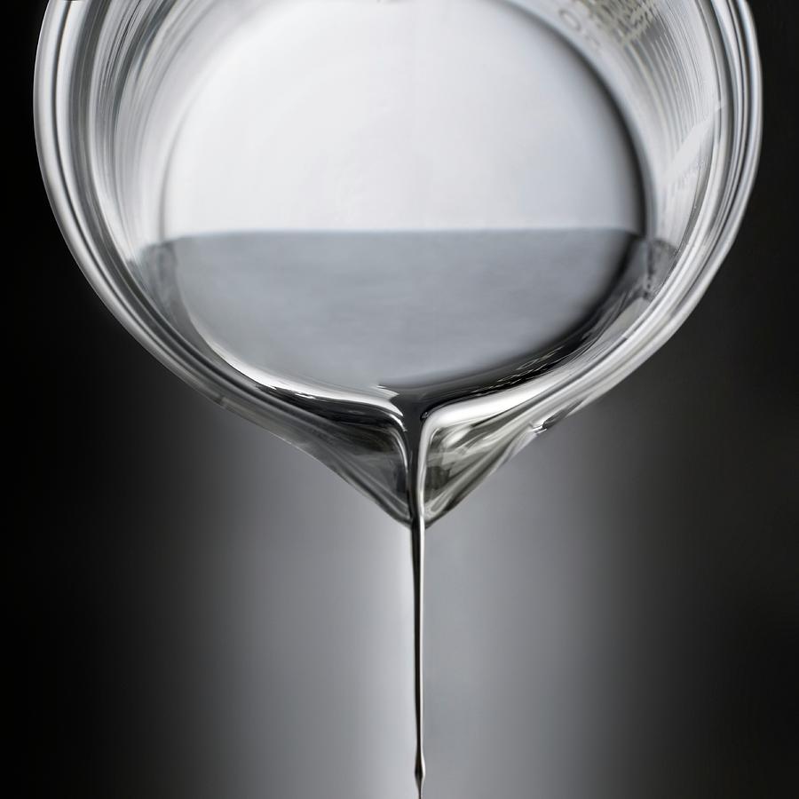 Mercury Pouring From A Beaker #1 Photograph by Science Photo Library