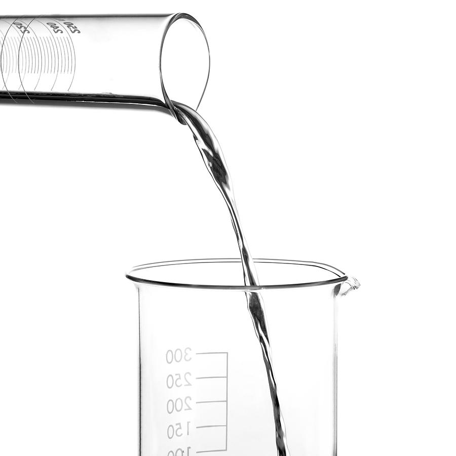 Quicksilver Photograph - Mercury Pouring From A Measuring Cylinder #1 by Science Photo Library