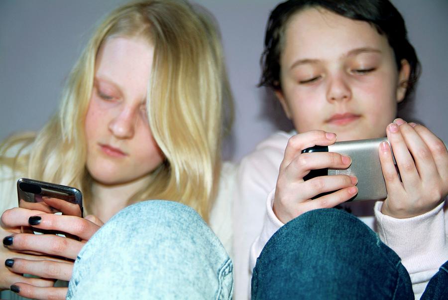 Device Photograph - Mobile Phone Use #1 by Hannah Gal/science Photo Library