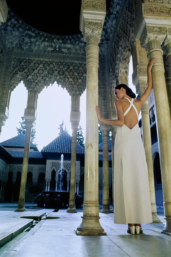 Model Wearing A White Pertegaz Dress Photograph by Raymundo de Larrain