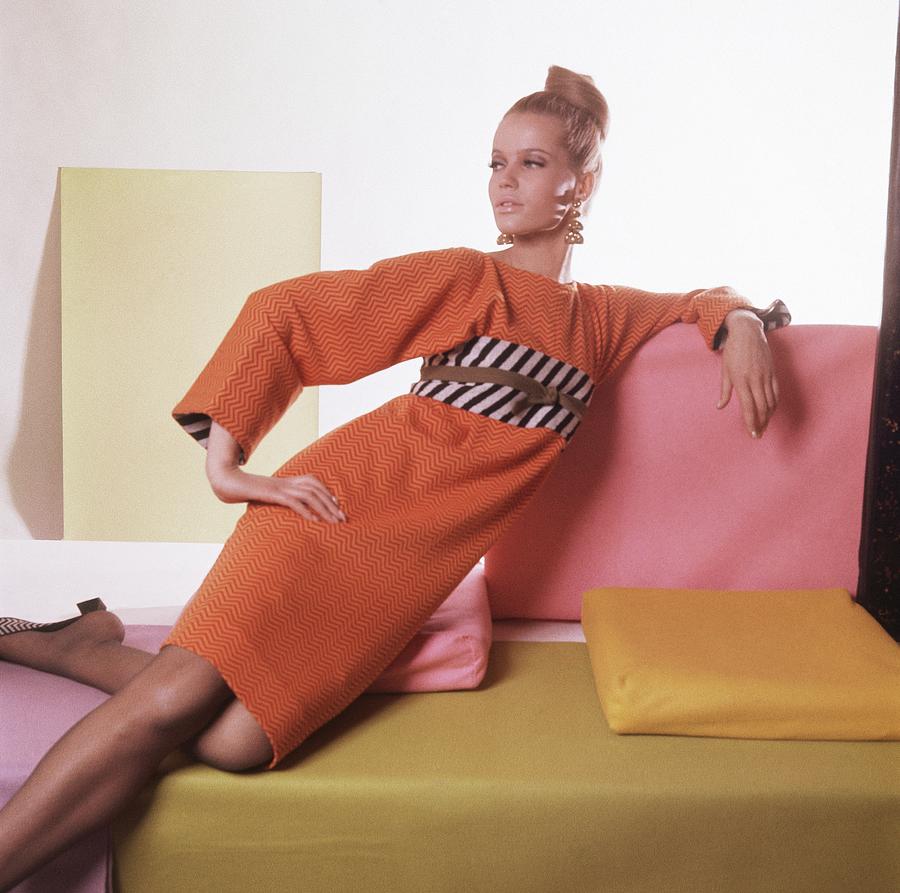Model Wearing Orange And Striped Dress Photograph by Horst P. Horst