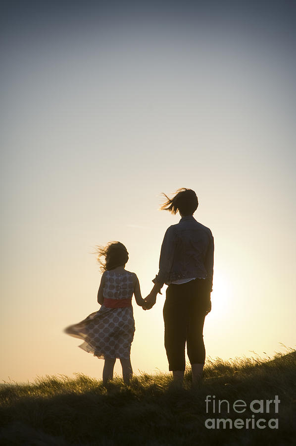 Download Mother And Daughter Holding Hands Photograph by Lee Avison