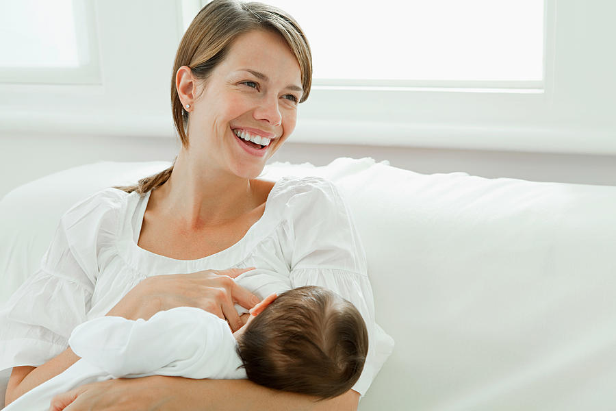Mother breast feeding baby #1 Photograph by Image Source