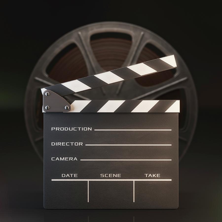 Movie Reel And Clapperboard #1 Photograph by Ktsdesign