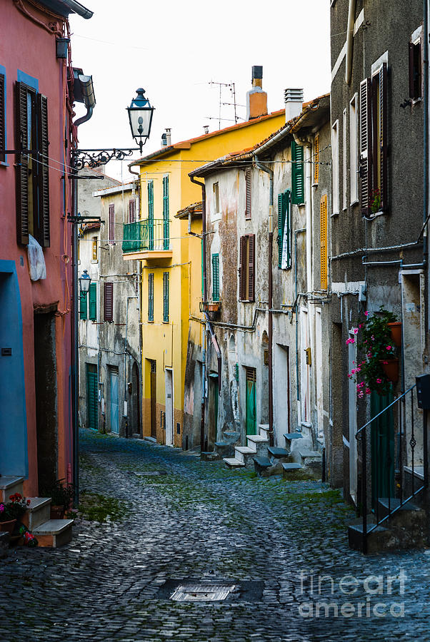 Narrow streets of houses at Valentano in Lazio #1 Photograph by Peter Noyce