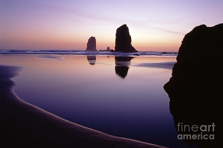 Inspirational Photograph - Needles silhouetted Cannon Beach Oregon #1 by Jim Corwin