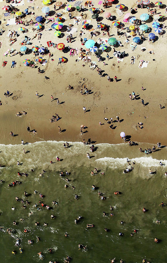New Yorkers Seek Relief From Summer #1 Photograph by Mario Tama