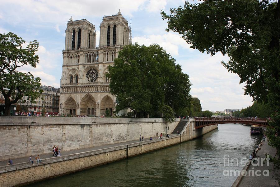 Notre Dame Along The Seine Photograph