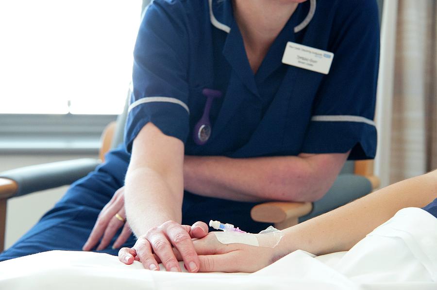 Nurse Comforting A Patient #1 Photograph by Lth Nhs Trust/science Photo Library