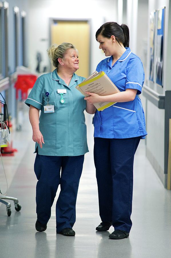 Nurses Talking In Corridor #1 Photograph by Lth Nhs Trust/science Photo Library