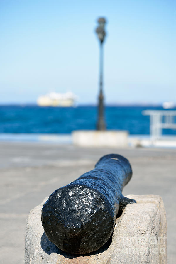 Old cannon in Aegina port #3 Photograph by George Atsametakis