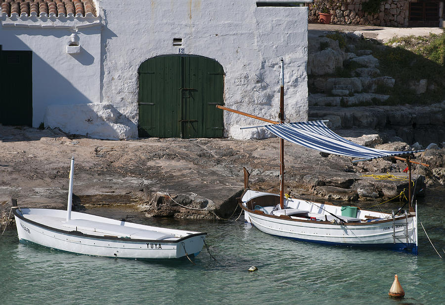 Typical mediterranean fishermen boat and house in Minorca Island - Old fishermen villa Photograph by Pedro Cardona Llambias