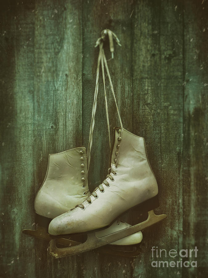Old pair of womans skates hung on barn door             #1 Photograph by Sandra Cunningham