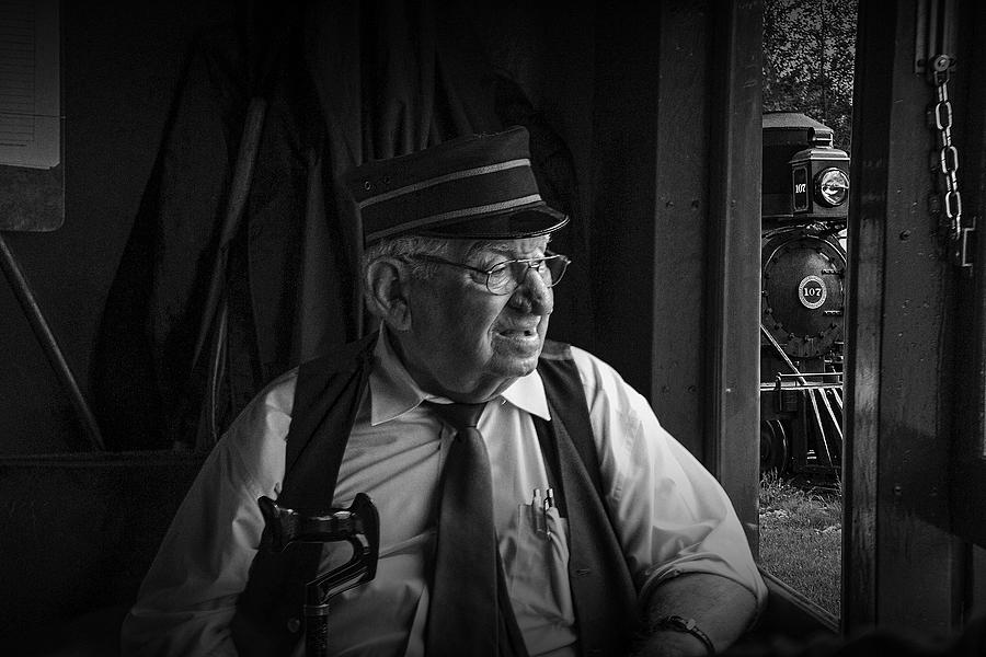 Black And White Photograph - Old Train Conductor #1 by Randall Nyhof
