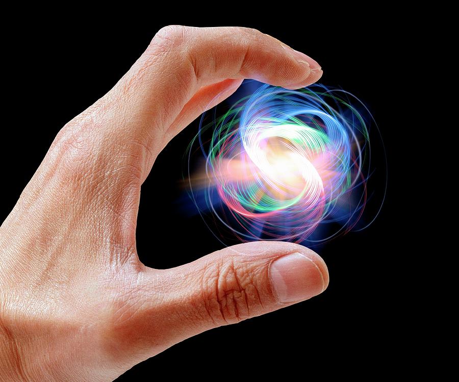 Person Holding Particle #1 Photograph by Victor De Schwanberg