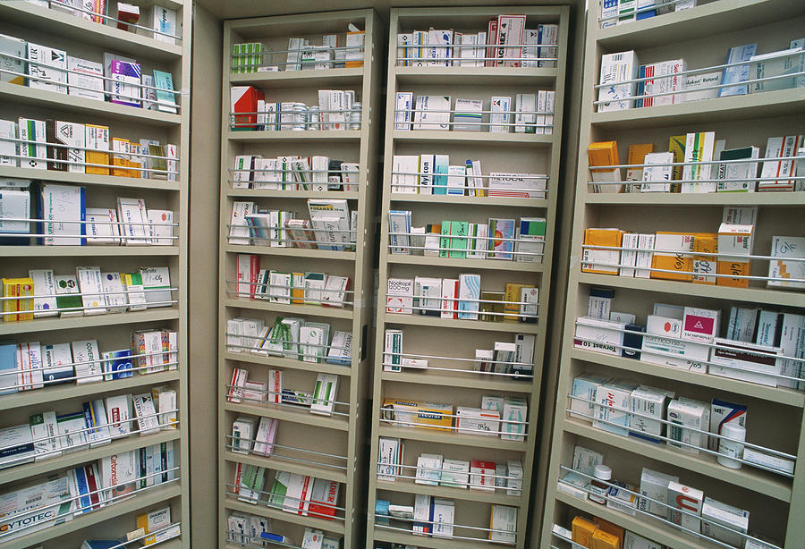 Pharmacy Medicine Cupboard #1 Photograph by Mauro Fermariello/science Photo Library