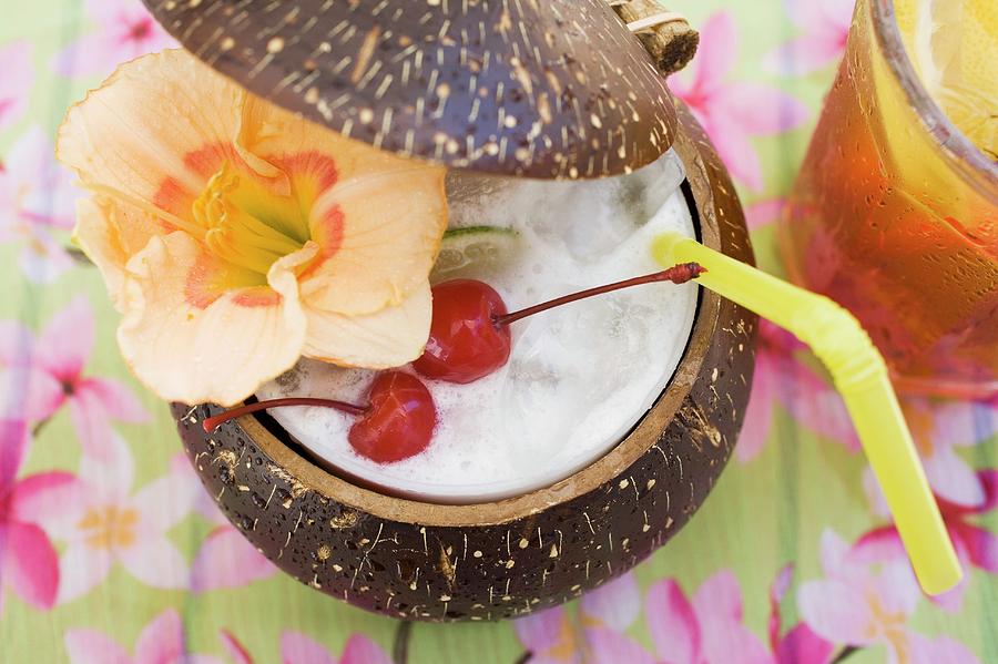 Pina Colada With Flower And Cherries Photograph by Foodcollection ...