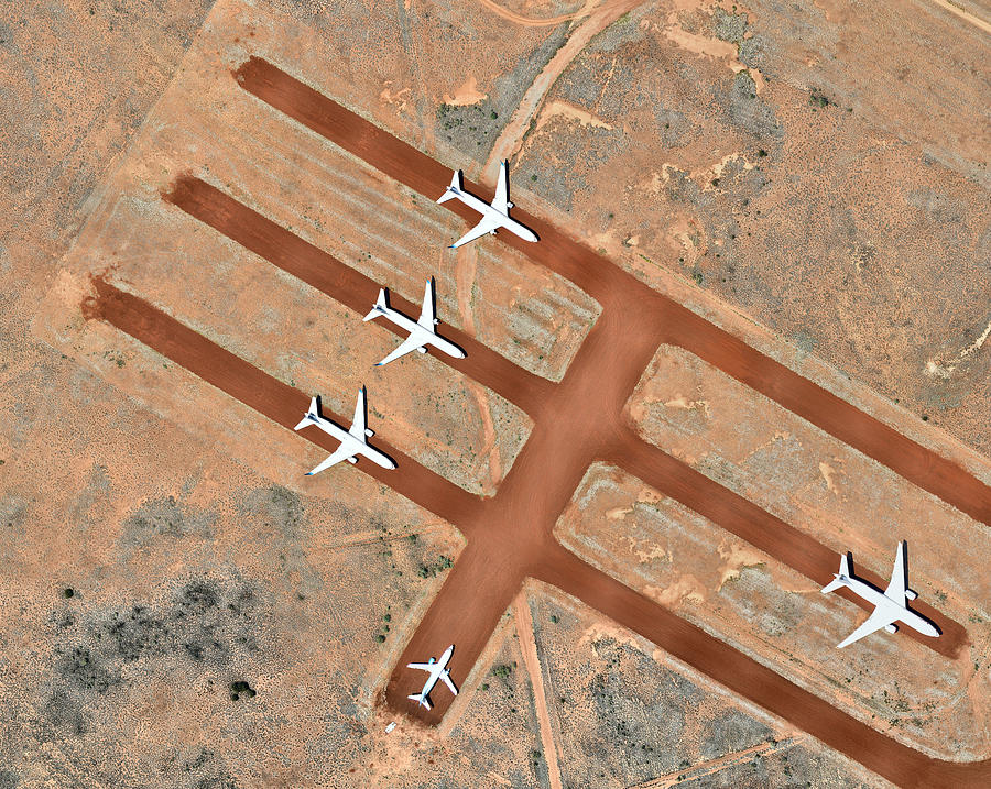 Planes parked at airport #1 Photograph by Nearmap