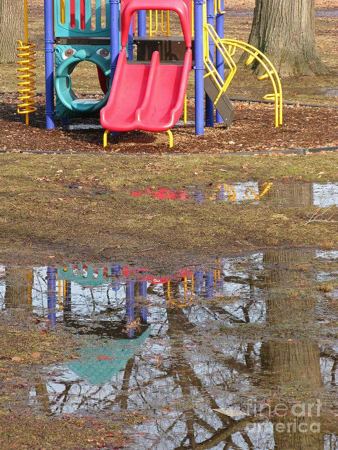 Playground Puddles Photograph by Ann Horn