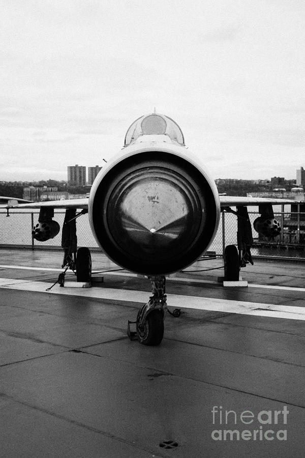 Winter Photograph - Polish air force Mig 21 PFM on display on the flight deck at the Intrepid Sea Air Space Museum #1 by Joe Fox