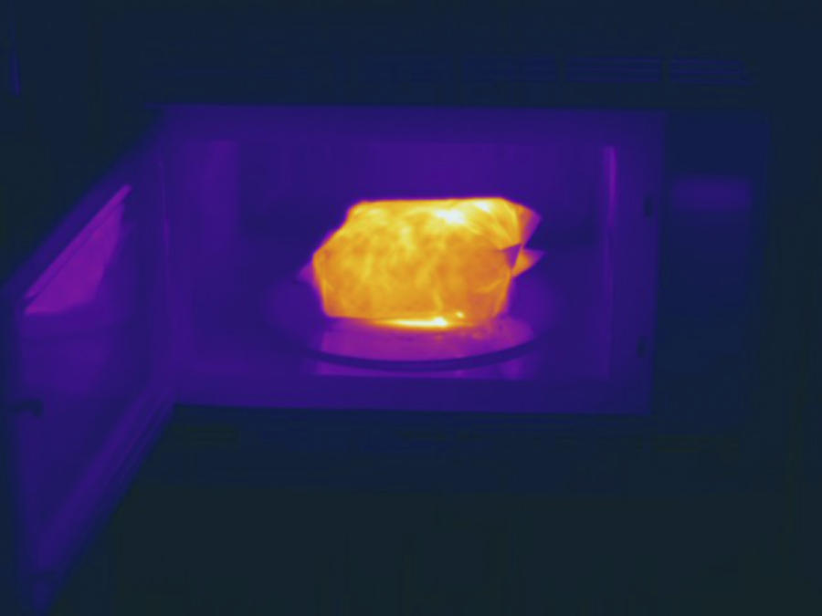 Popcorn Popping In Microwave, Thermogram #1 Photograph by Science Stock Photography