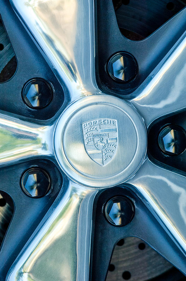 Porsche Wheel Emblem #1 Photograph by Jill Reger