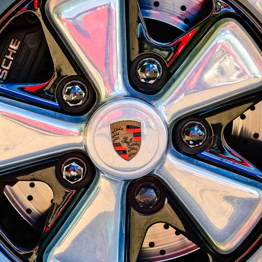 Porsche Wheel Rim Emblem #1 Photograph by Jill Reger