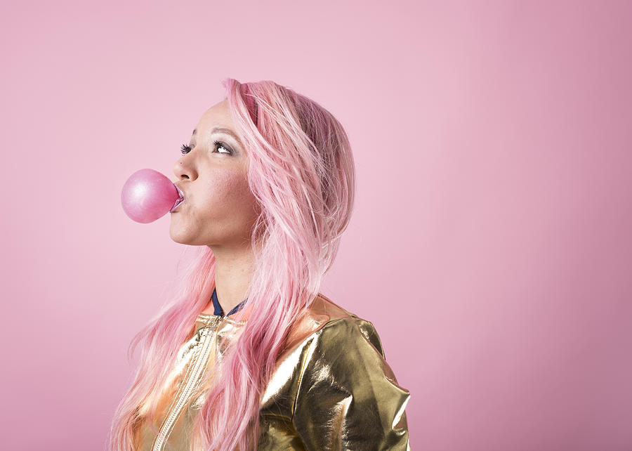 Portrait of a woman with pink hair #1 Photograph by Roos Koole