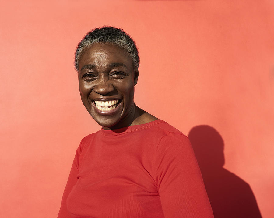 Portrait of mature woman laughing #1 Photograph by Flashpop
