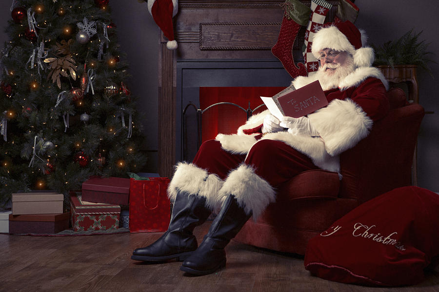 Portrait of the Real Santa Claus reading Christmas Card #1 Photograph by Inhauscreative