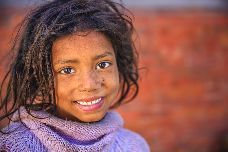 Portrait of young Nepali girl in Bhaktapur, Nepal #1 Photograph by Hadynyah