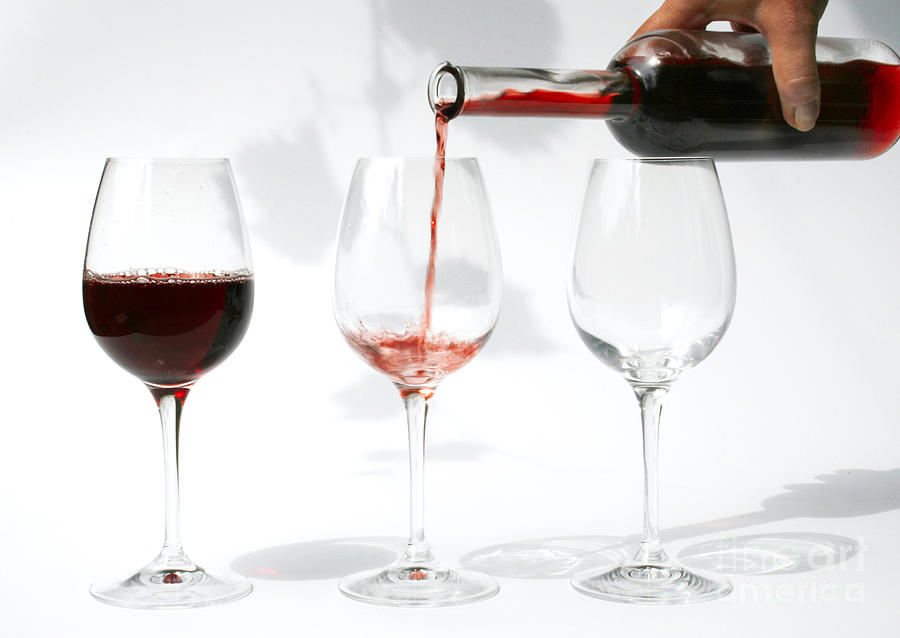 Pouring Red Wine Into Glass Photograph by Patricia Hofmeester