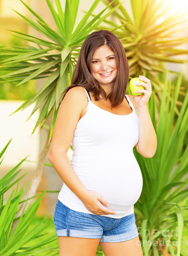 Parenthood Movie Photograph - Pregnant woman eating apple #1 by Anna Om